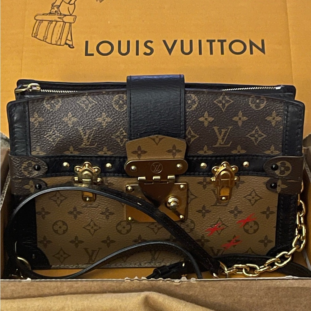 Authentic like new Louis Vuitton reverse monogram trunk crossbody Brown& Black